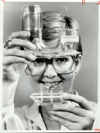 Sonja Jensen shows how bottom can be removed from see-through plastic sink trap to remove valuables ? such as this ring ? that go down the drain. Kale(...)