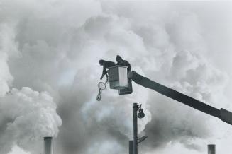 Working In Man Made Clouds, These hydro employees seem to be working high in the clouds near the Lakeview generating station, but actually they are ju(...)