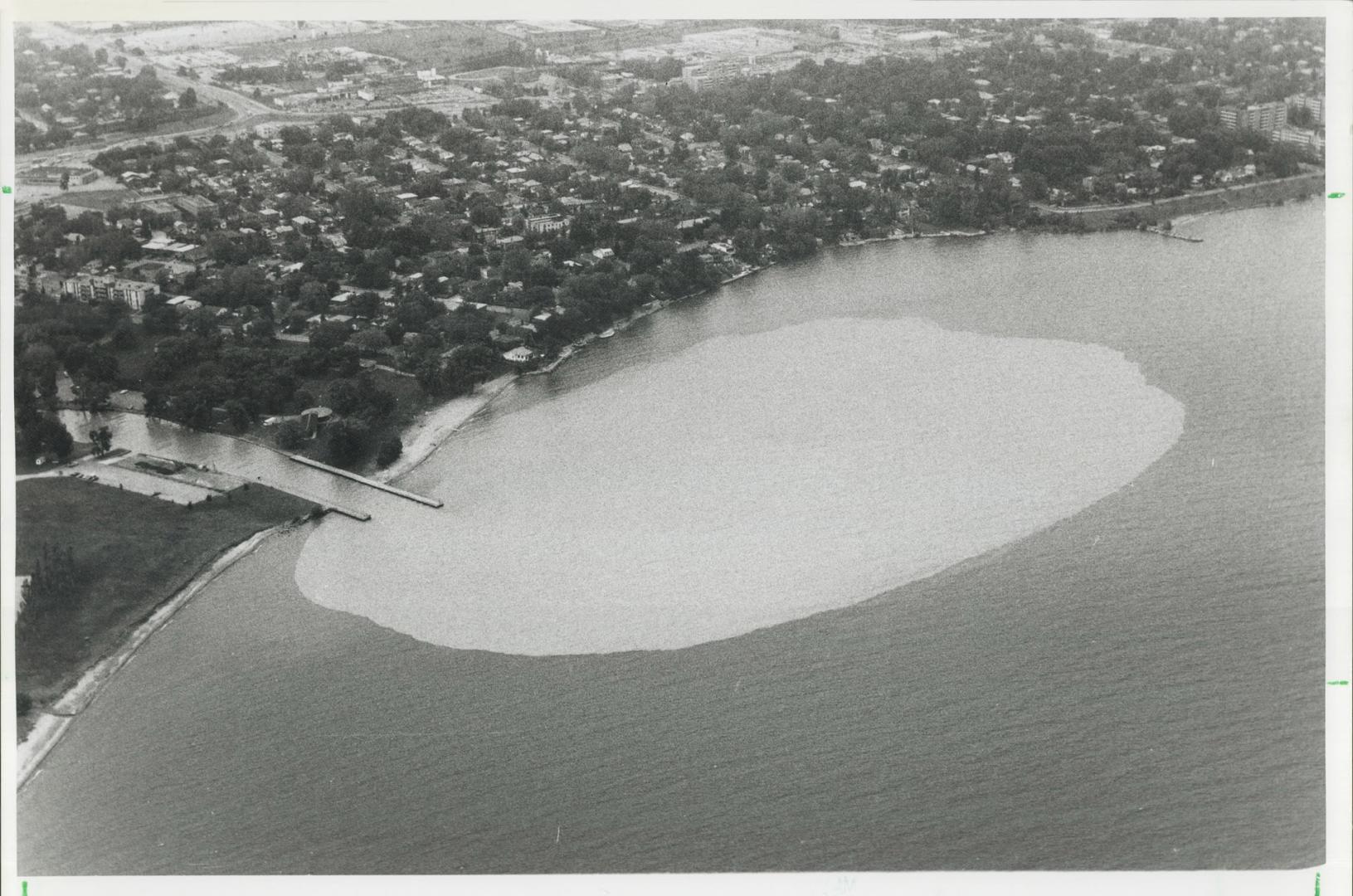 Pollution pours into Lake Ontario out of the mouth of Etobicoke Creek, adding yet another ingredient to a recipe of toxins poisoning this natural resource