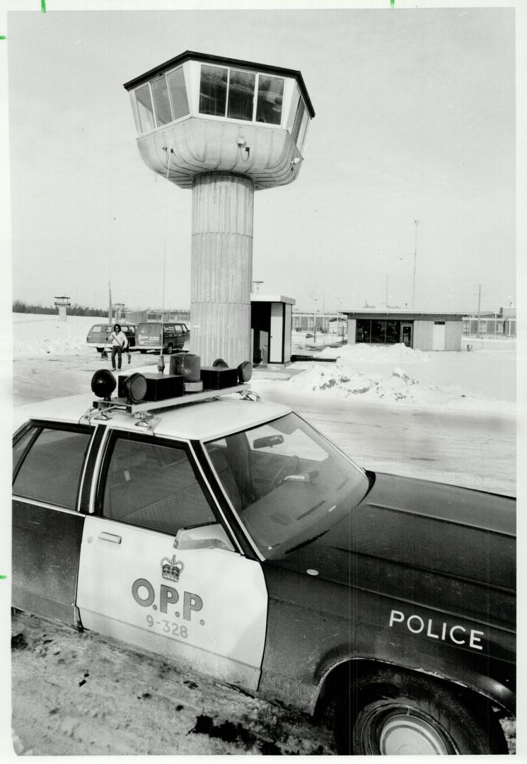 Eternal watch: A massive watchtower, manned night and day, is the first sight convicts see when they arrive at Millhaven, Canada's toughest maximum-security penitentiary