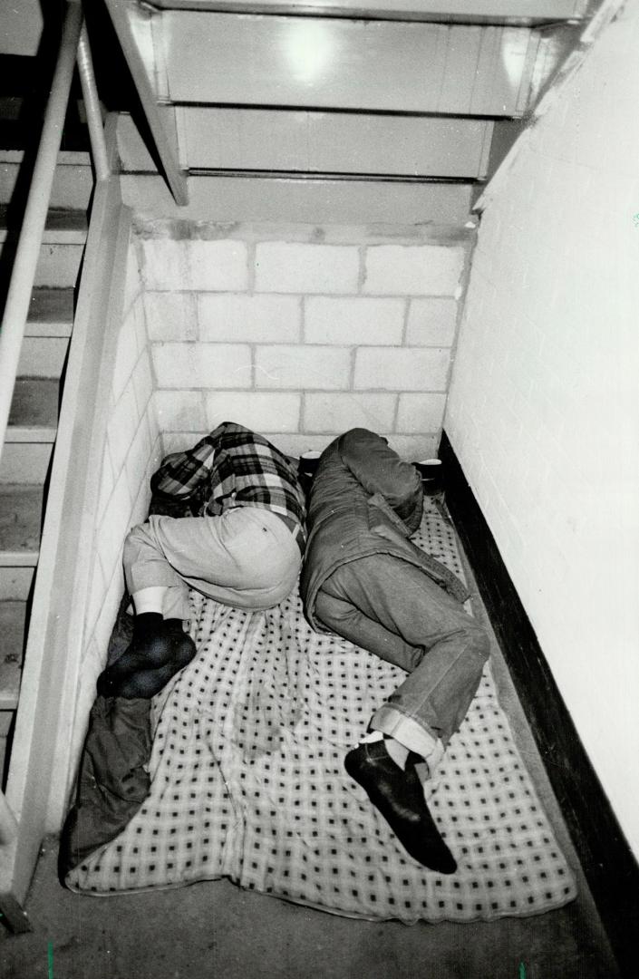 Last resort: Some homeless folk shun city hostels, finding shelter in spots such as this, under a stairwell in the City Hall parking garage