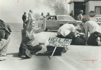 Young protester looks happy she's not glowing