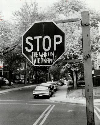 Sign at Bernard Ave. and Huron St., These days protesters seem to be everywhere