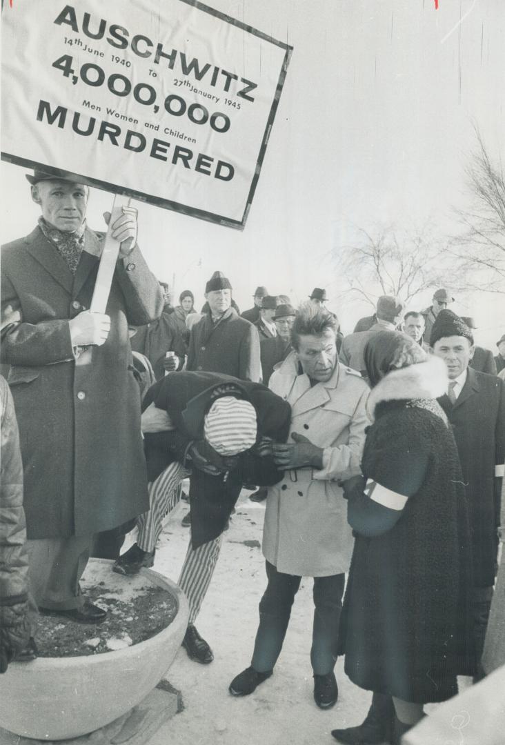 As prayer for all Jewish dead began, Sherwood collapsed, Three of his relatives and 35 of his classmates were killed in Auschwitz