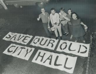 They painted save our old city hall on an Eaton's warehouse, Left