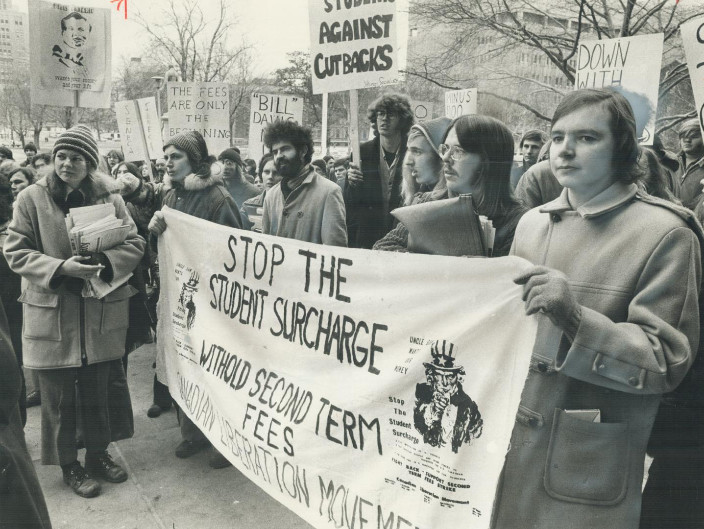 Students demonstrate outside Queen's Park yesterday against a $100 increase in university and college fees set in the provincial budget last spring an(...)