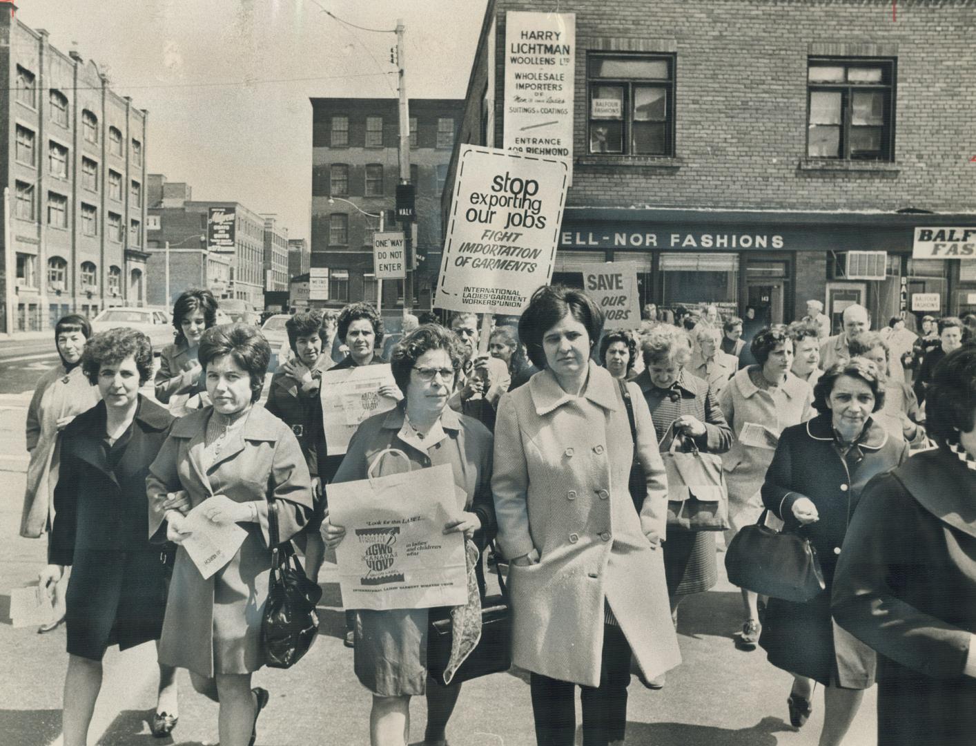 About 1,500 Members of the International Ladies Garment Workers Union demontrated yesterday in the heart of the garment district on Spadina Ave., to urge limits on clothing imports. [Incomplete]