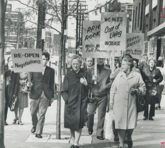 Garment workers demand pay raise, Parading down Spadina Ave