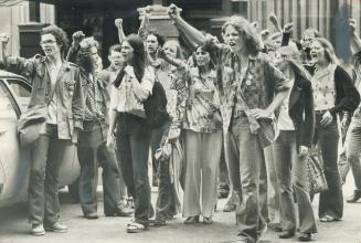 Fists Raised, demonstrators outside the Park Plaza Hotel yesterday jeer members of the Western Guard, a group of right-wing extremists and white supre(...)