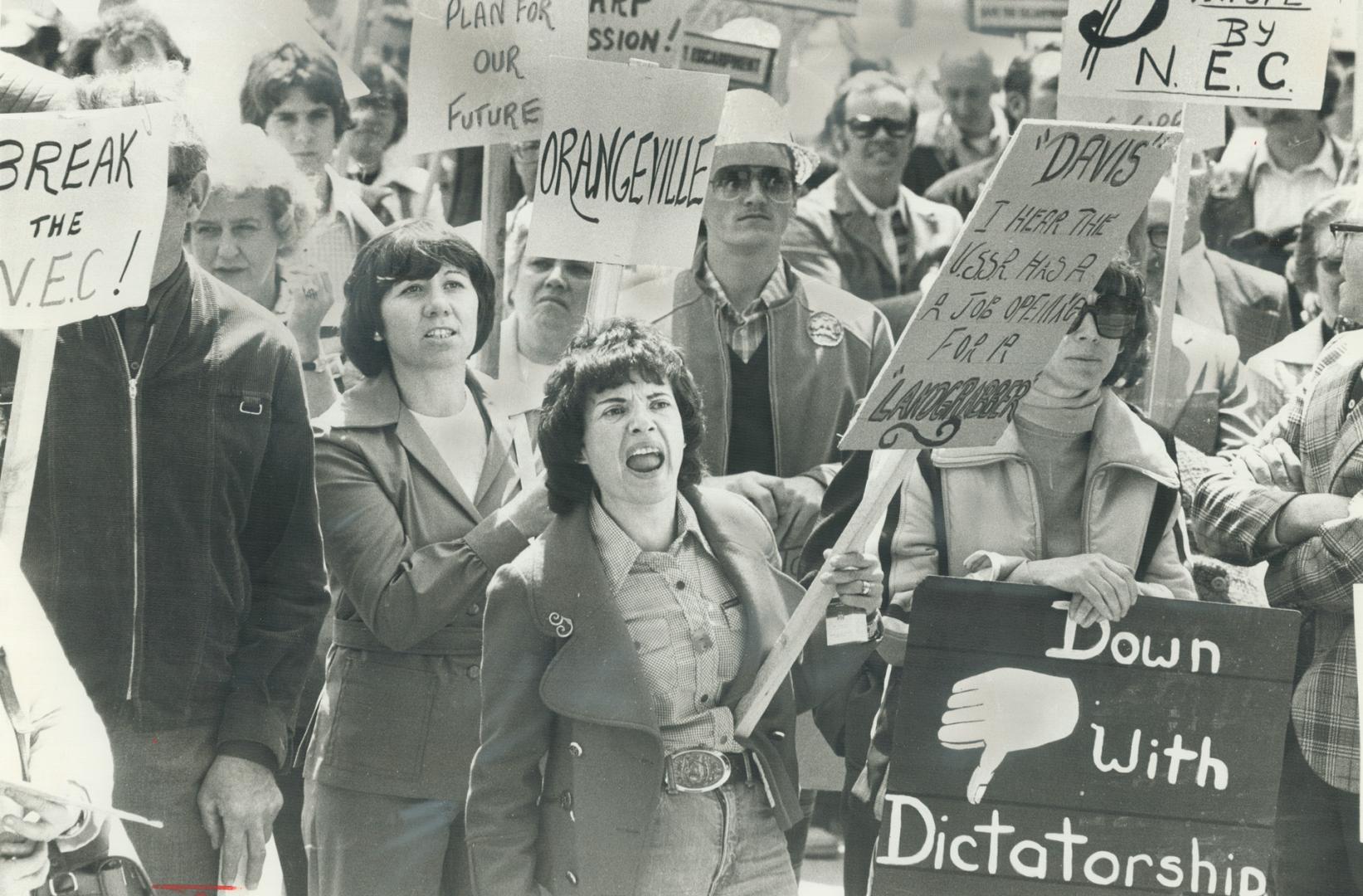 Mono township resident Gail Smith (at front) shouts at a speaker for the Bruce Trail Club at a rally in Queen's Park yesterday. She was with a group o(...)