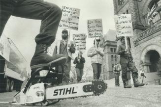 Chainsaw gang, Angry Midland loggers, who work for Ritchie Forest Products, marched on Queen's Park yesterday claiming the province is threatening the(...)