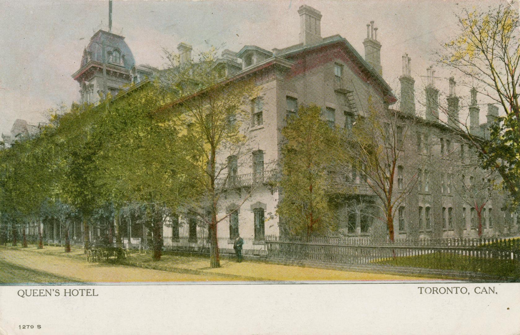 Colorized picture of a four story hotel building.