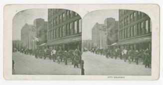 Pictures show many teams of horses and wagons waiting outside a large store.