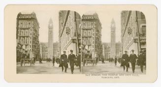 Pictures show a downtown city street scape with skyscrapers.