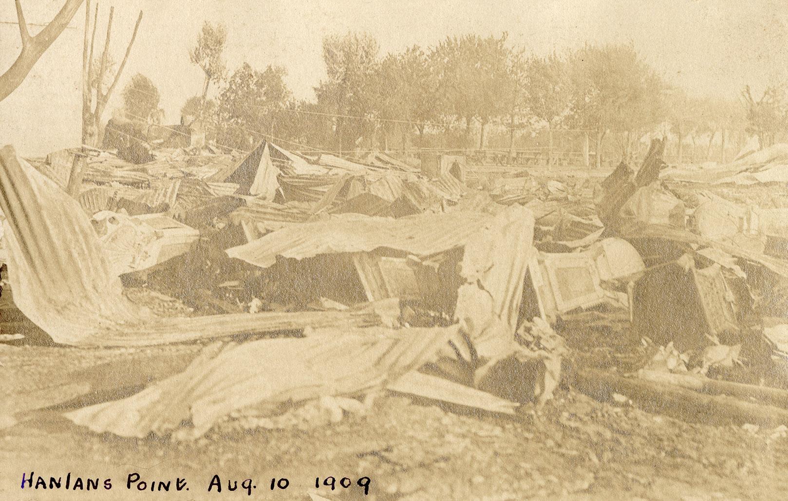 Black and white photograph of building demolished due to fire damage.