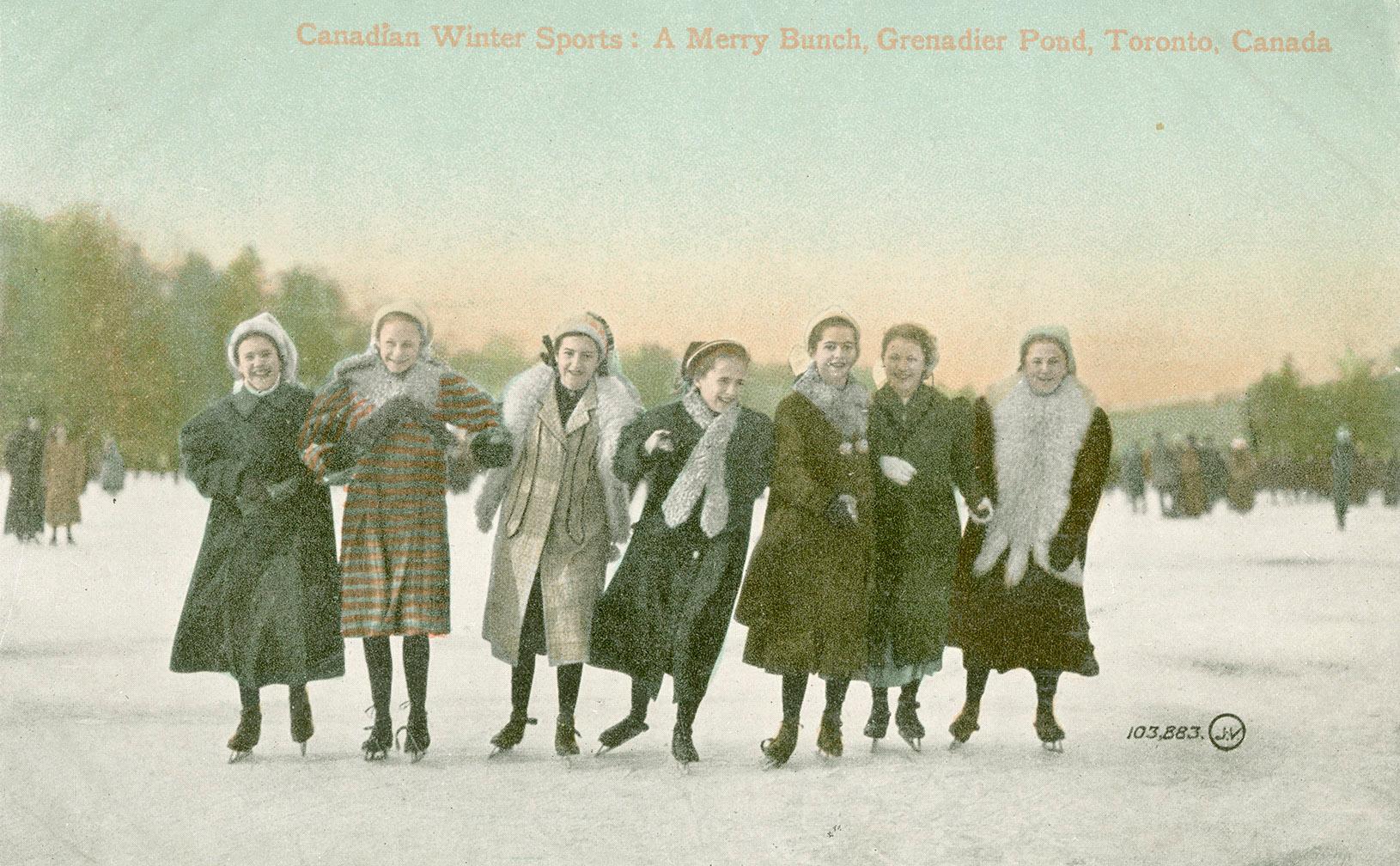 Seven women skating on a frozen pond.