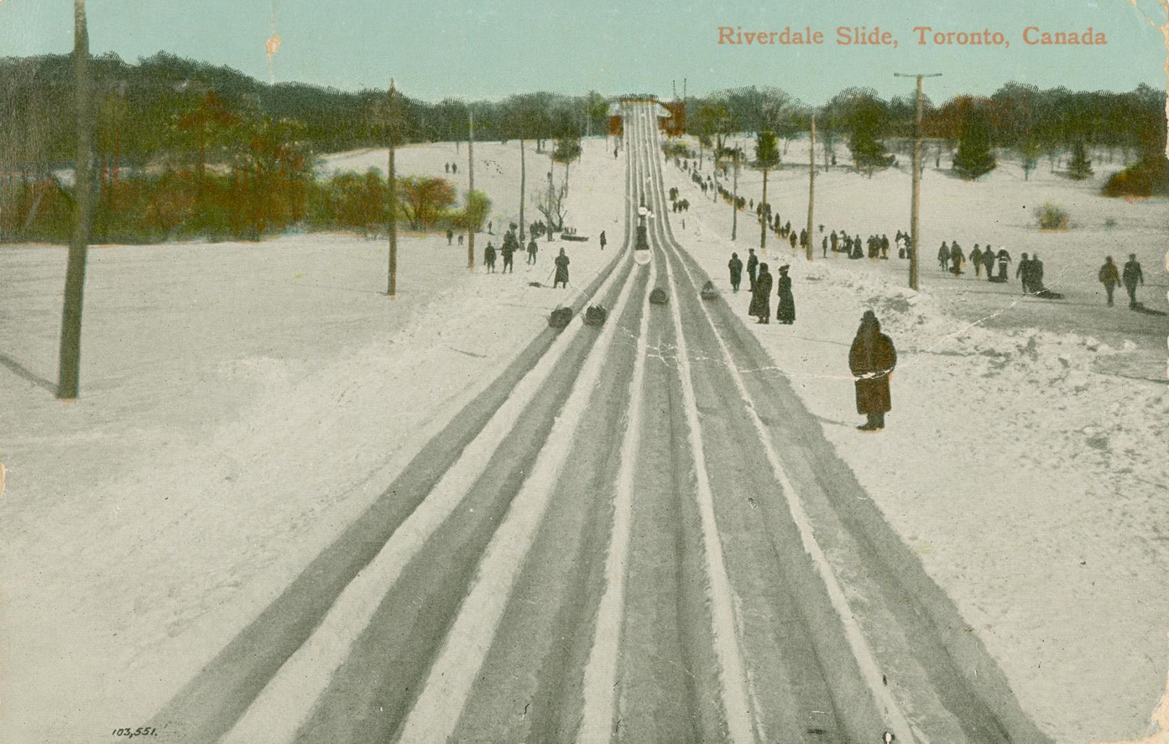 People tobogganing down six individual slides. 