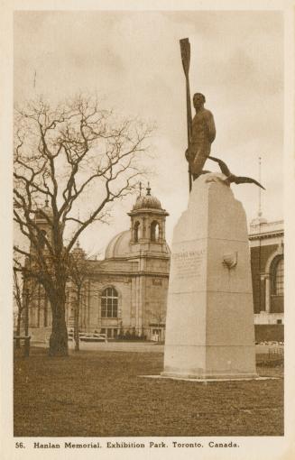 Sepia tone picture of a large monument standing in the C.N.E. grounds.