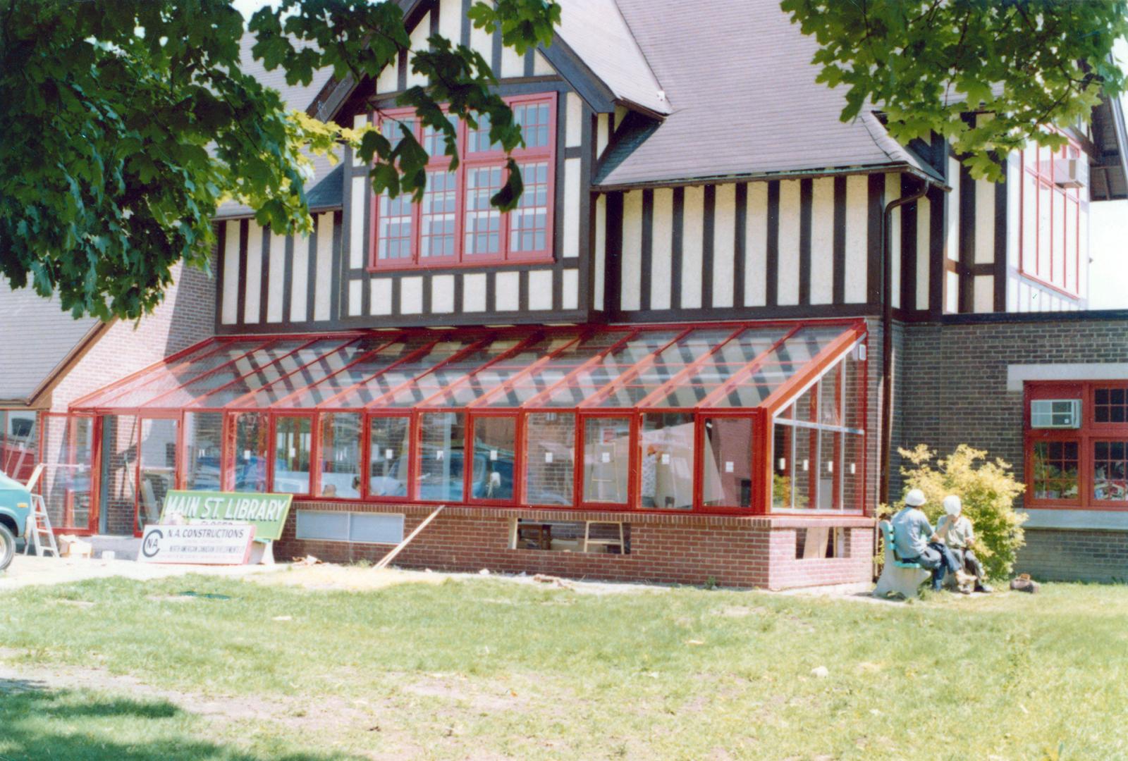 Front view of glass solarium at Main Street library 