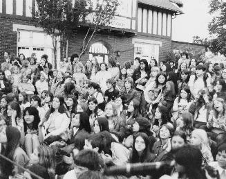 Group of young people watching a concert