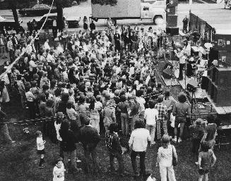 Crowd of young people at outside concert