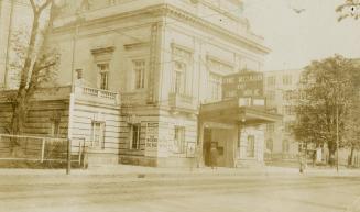 Black and white photograph of theatre displaying a show &quot;The Wizard of the Nile&quot;.