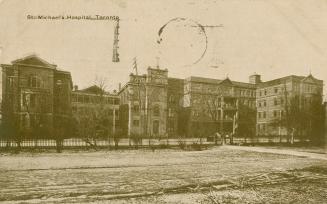 Black and white photograph of a large hospital complex.