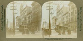 Pictures show a street car at a busy city intersection.