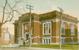 Colorized photograph of a red brick public building with two columns surrounding the front entr…