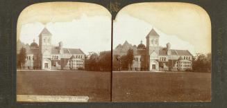 Pictures show a large stone university building with a tower.