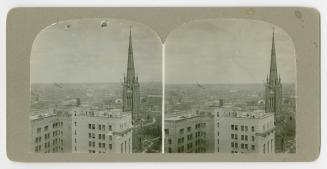 Ariel view of a city with a prominent church steeple