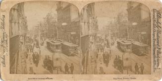 Stereoscopic photograph card of the view looking west along King Street from the Grand Opera Ho…