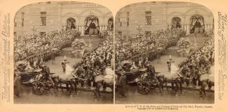 Pictures show a huge crowd in front of a Richardsonian Romanesque building waiting to greet the…