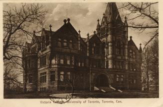 Sepia toned picture of a huge Richardsonian Romanesque building with a central tower.
