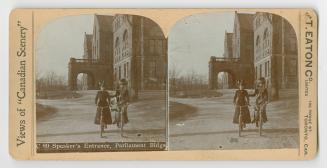 Pictures show two women on bicycles on a path in front of a covered entrance of a very large Ri…