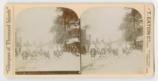 Pictures show a band of men in kilts marching in unison.