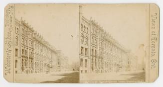 Pictures show a row of four story buildings to the right of a city street.