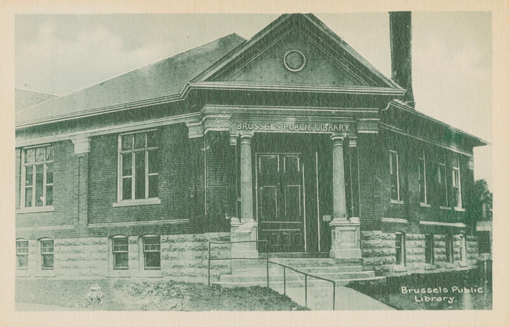 Picture of one storey library building with front pillars. 