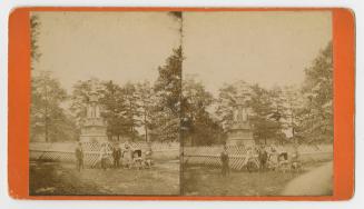 Pictures show people standing in front of a picket fence surround and Italian renaissance style…