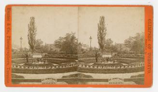 Pictures show a gardener working in a huge, circular beds of roses.