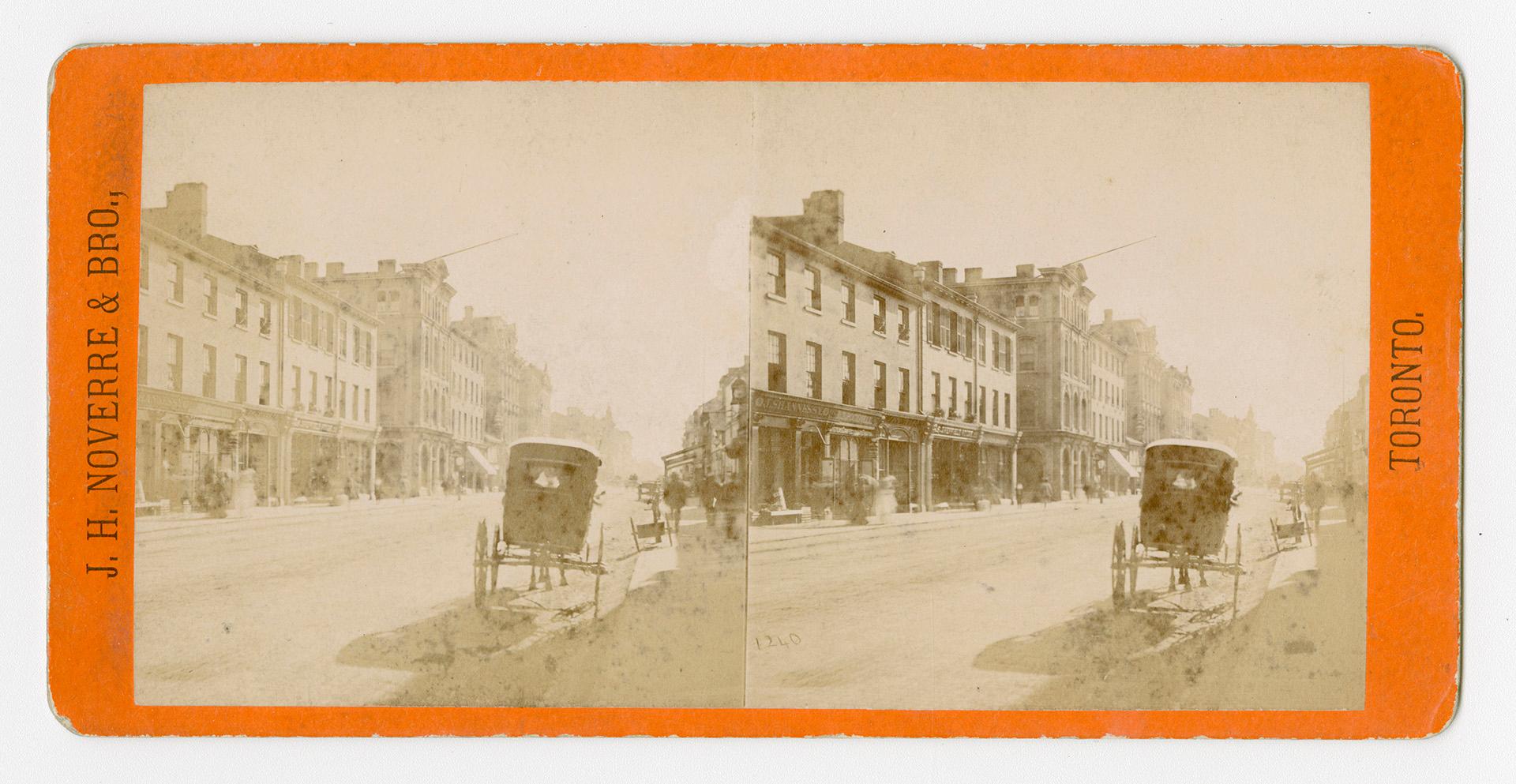 Pictures show commercial buildings on the south side a street with a horse and buggy in the for…