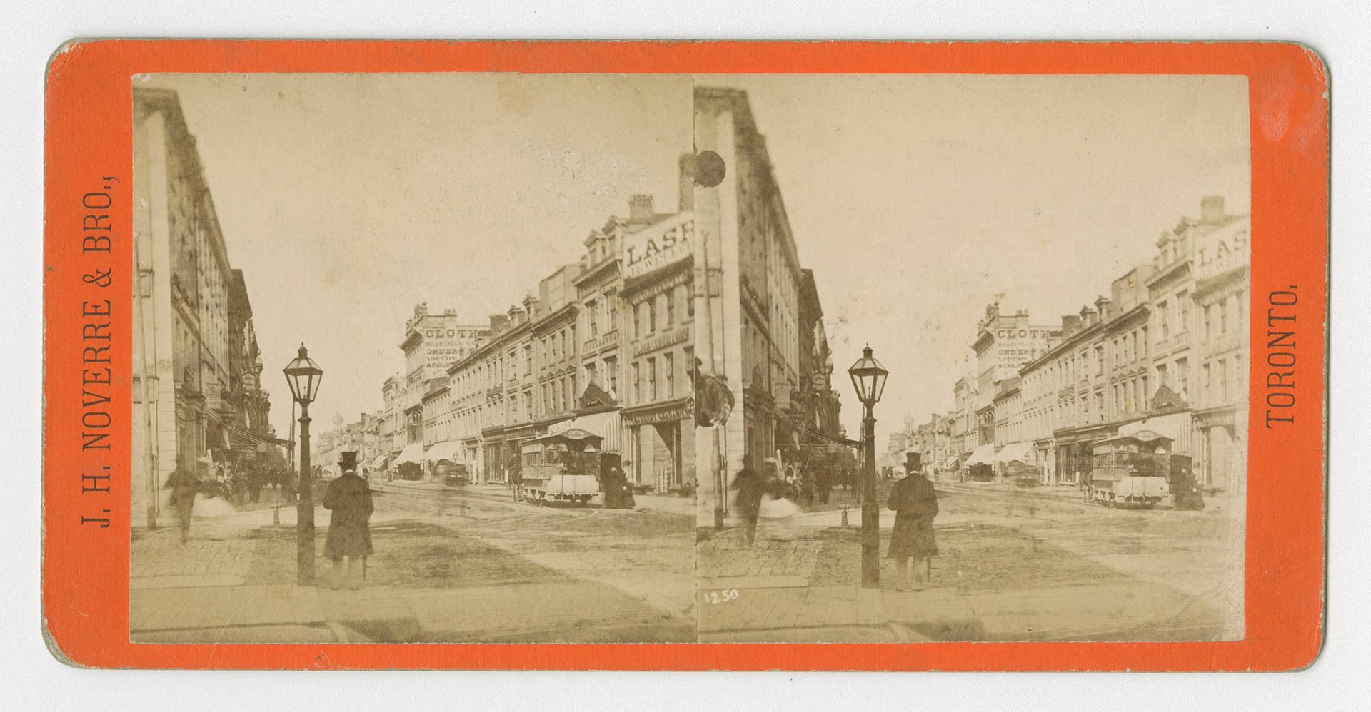 Pictures show a busy city street with three or four story buildings on either side.