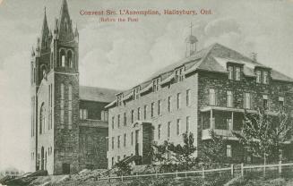 Black and white picture of two large stone building, one with two steeples.