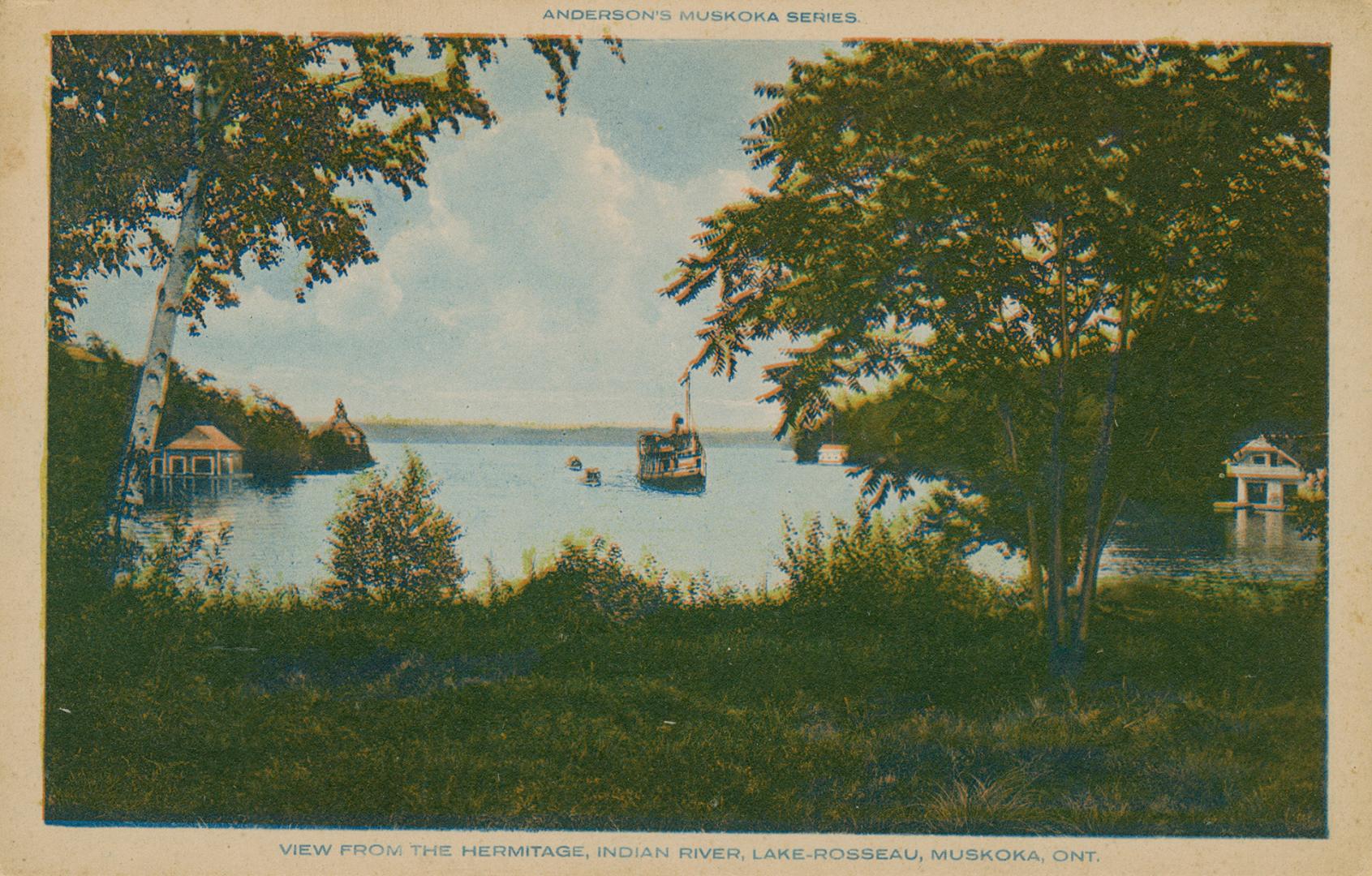 A steam boat coming in to dock in a bay of a lake.