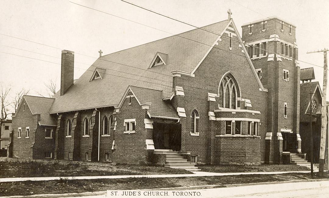 Picture of large church building with square tower on right side. 