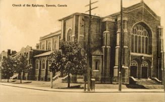 Picture of large corner church building. 