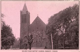 Large corner church with tower and dome. 