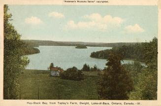 A large lake with an Island in the middle of it.