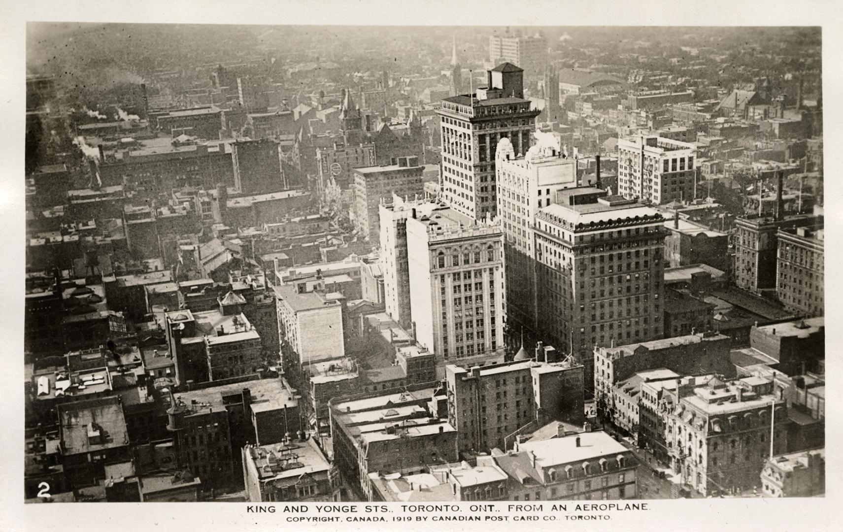 Aerial shot of a large city. Black and white.