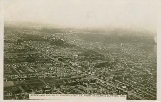 Aerial shot of a large city. Black and white.